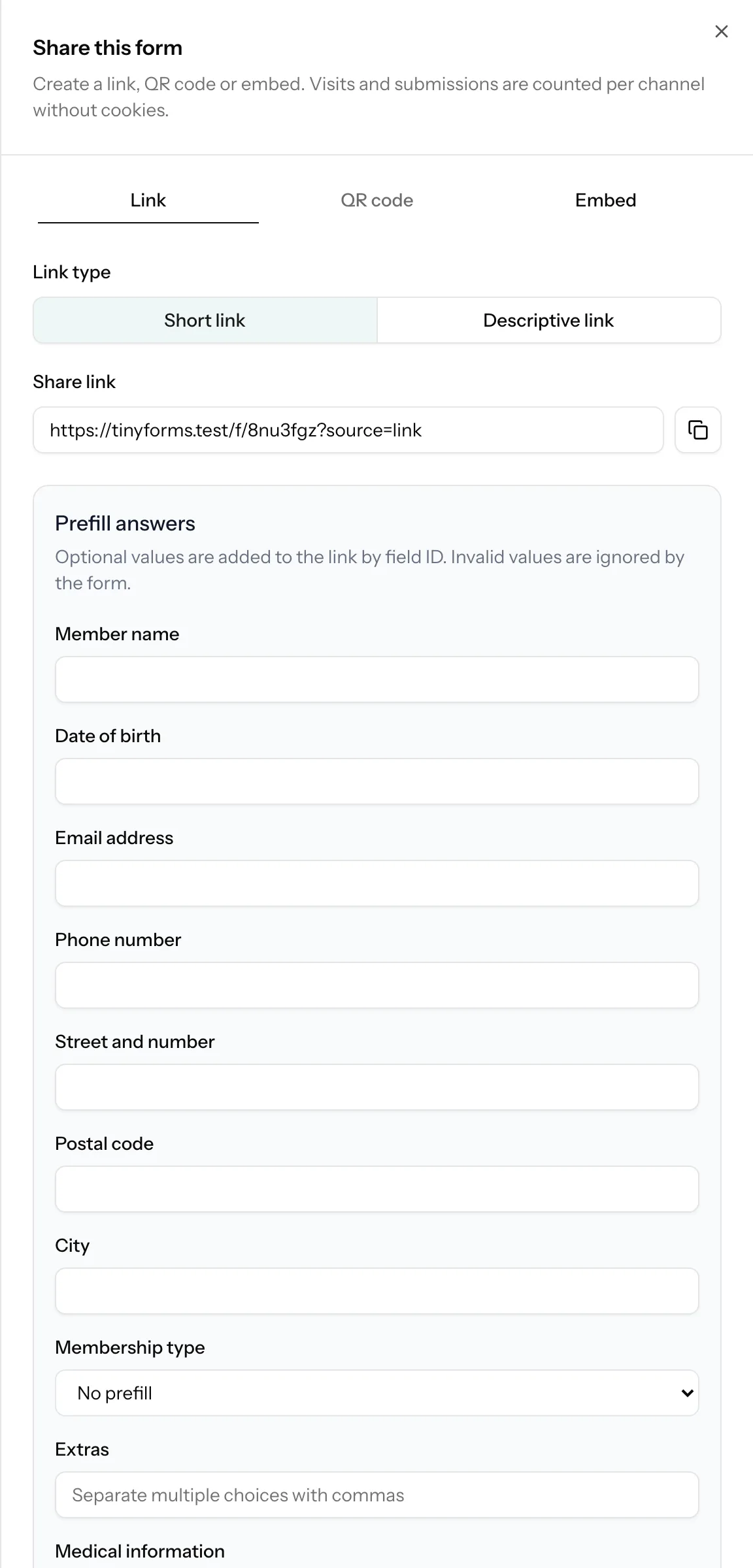 The share sheet of a form, with tabs for the link, the QR code and the embed, and fields to prefill answers.